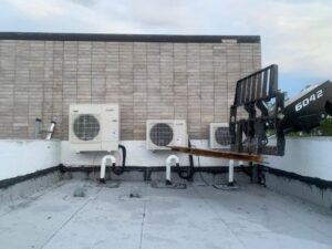 prime three mitsubishi units on roof top